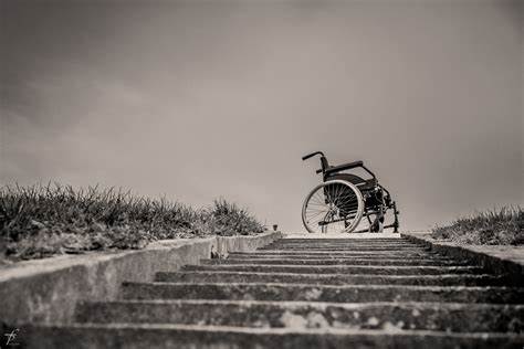 Wheelchair at the top of stairs